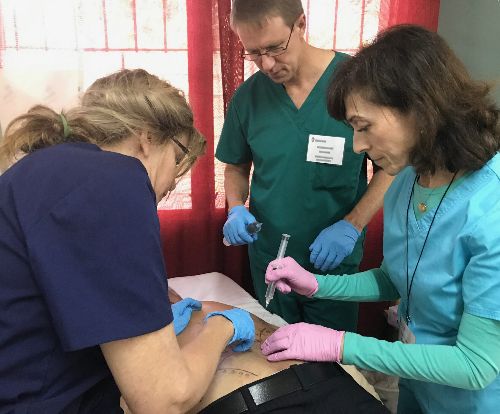 Dr. Gloria Tucker in Marin County CA teaching prolotherapy to other physicians
